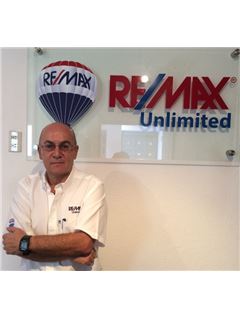 가맹점주 - Juan Carlos F - RE/MAX Unlimited