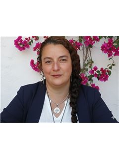 Ruth  de la Peña - RE/MAX Colonial