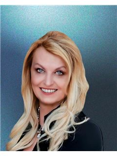 Loretta Marie Senowski - RE/MAX Costa del Mar