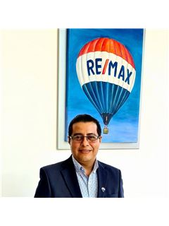 Broker/Owner - Karim Oviedo - RE/MAX Espacios Hábitat
