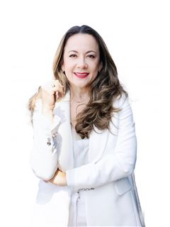 Paola Zayas - RE/MAX Grand