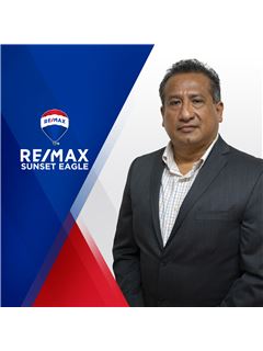 Enrique  Santiago Cedano - RE/MAX Sunset Eagle