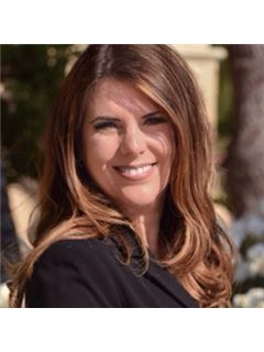 Mabel Rodriguez - RE/MAX Premier Realty