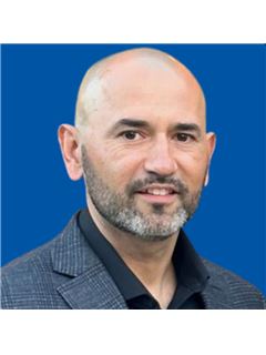 Carlos Skubacz - RE/MAX 2000