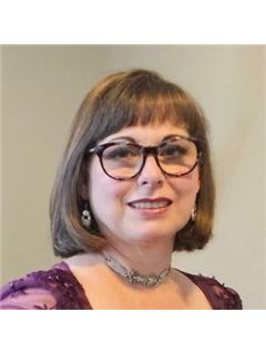 Shelli McNeill - RE/MAX College Park Realty