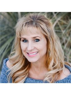 Danica J Coyle - RE/MAX Classic Realty
