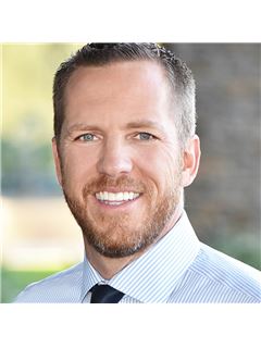Justin Cook - RE/MAX Solutions