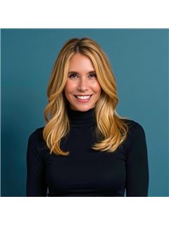 Andi Ahart - RE/MAX Advantage