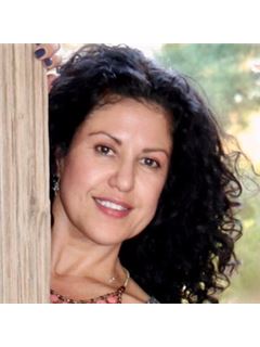 Stella Martinez - RE/MAX Classic Realty