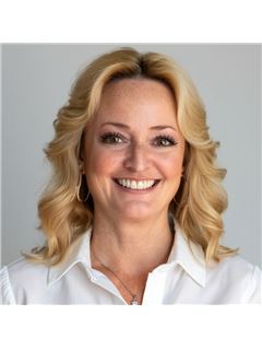 Michele Lucero - RE/MAX Professionals