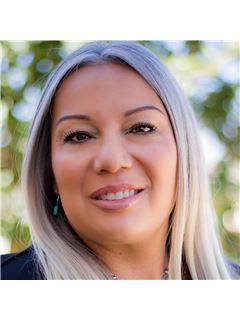 Atilana Herrera - RE/MAX Classic Realty