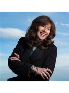 A. Janelle Pfleiger - RE/MAX Dynamic Properties
