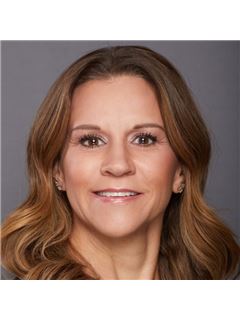 Jill N. Laudermilk - RE/MAX Northwest Inc