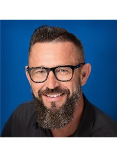 Justin Scheer - RE/MAX Alliance