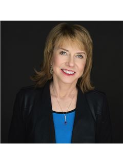 Leah R. Baxter, CRS, GRI, CNE, CHLMS - RE/MAX Properties of the Summit