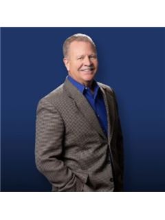 Bud D. Brecht - RE/MAX Alliance
