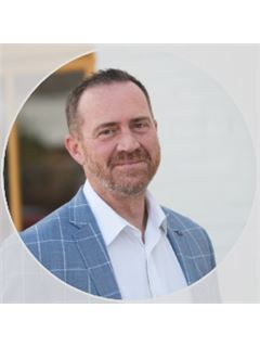 Zach P. McGuire - RE/MAX Alliance
