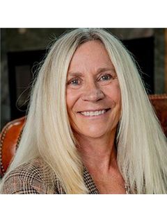 Caren Mapes - RE/MAX Properties of the Summit