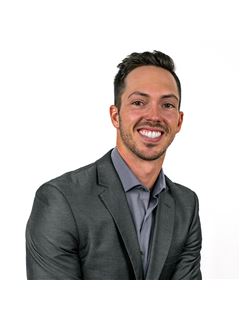Brennen Adams - RE/MAX Associates