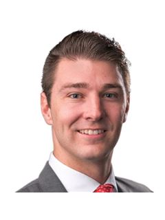 Kyle Schoney - RE/MAX Associates