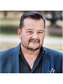 Michael C. Newton - RE/MAX Northwest Inc