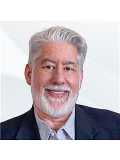 Eric M. Piel - RE/MAX Northwest Inc