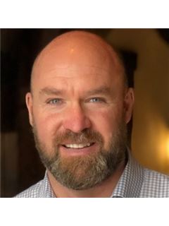 Brandon J. Calton - RE/MAX Associates