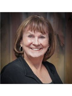 Leta J. Wilburn - RE/MAX 4000 Inc
