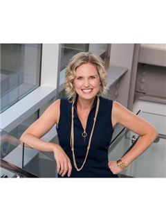 Katherine G. Porras - RE/MAX 4000 Inc