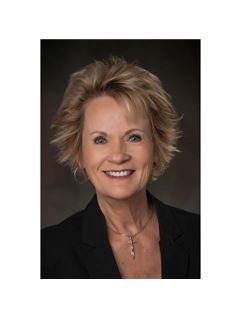Julie A. Butherus - RE/MAX 4000 Inc