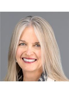 Annie Schneider - RE/MAX Professionals