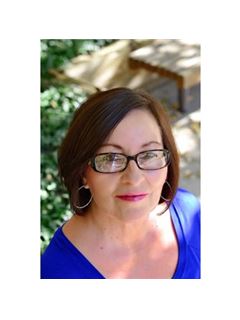 Lynn M. Romero - RE/MAX Northwest Inc
