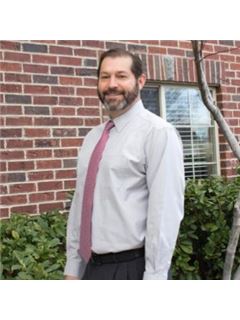 Chris J. Burton - RE/MAX Associates