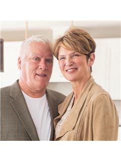 Mark J. Bartikoski - RE/MAX Results