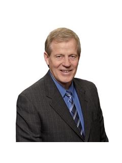 Curtis P. Carlson - RE/MAX Advantage Plus