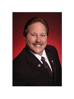 John E. Purple - RE/MAX Traders Unlimited
