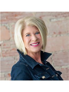 Michelle R. Bennett - RE/MAX Traders Unlimited