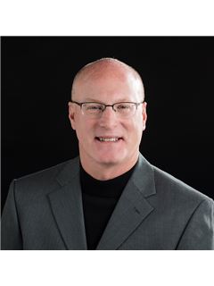 Rodney D. Schlosser - RE/MAX Traders Unlimited