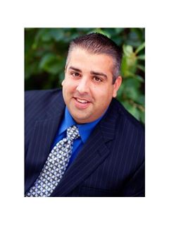 Adam G. LaHood - RE/MAX Traders Unlimited