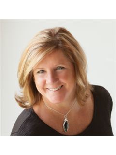 Barb Primm - RE/MAX Traders Unlimited