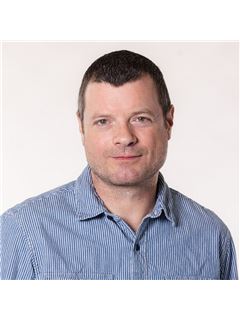 John Neely - RE/MAX Crossroads Properties