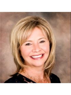 Julie Cox - RE/MAX Crossroads Properties
