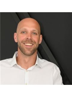 Zachary Fruchey - RE/MAX Infinity