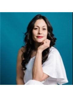 Carla B. Juvencio - RE/MAX Precision Realty