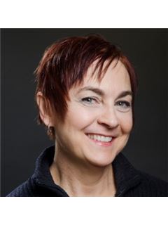 Dez L DeCarlo - RE/MAX Real Estate Center