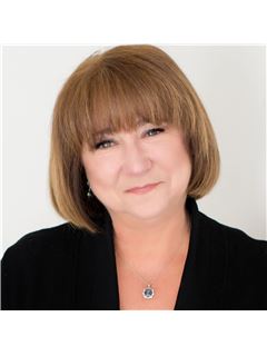 Dolores Rabuffo - RE/MAX Real Estate Center