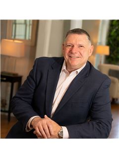 George W. Stansfield - RE/MAX Town and Country