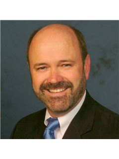 Kontorsägare & Reg. Fastighetsmäklare - Ken Crowley - RE/MAX Realty Group