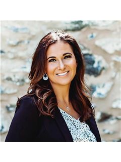 Rhi Wilson - RE/MAX Solutions