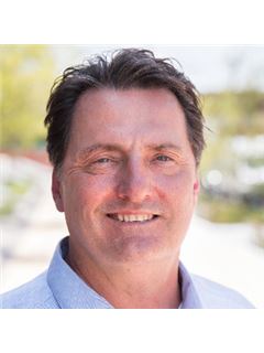 Broker/Owner - John L. Lesniewski - RE/MAX United Real Estate